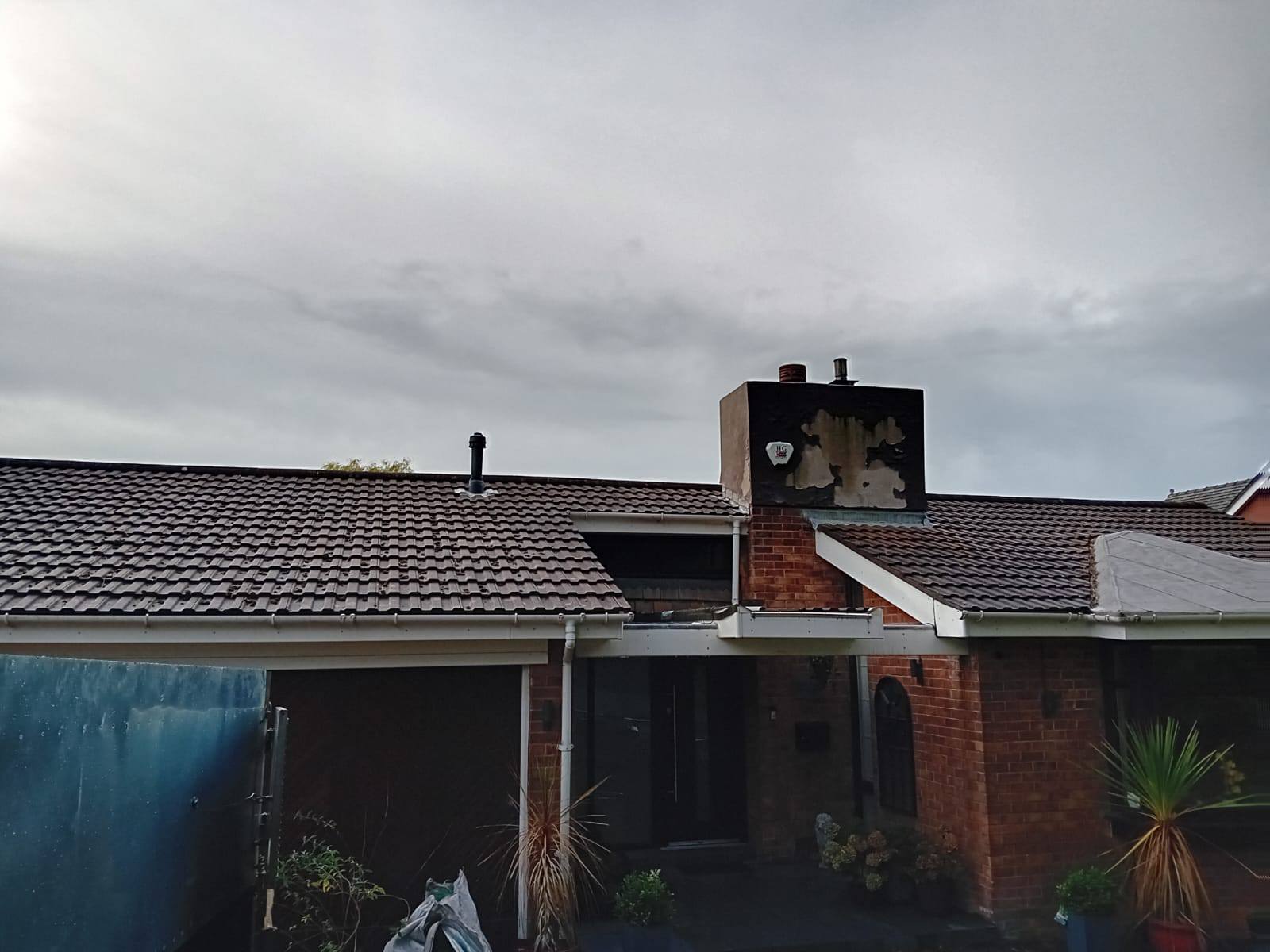 Roof before being cleaned in Wirral